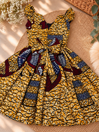 Robe à manches volantes enfant en wax, coloris Saffron Vine, vue à plat